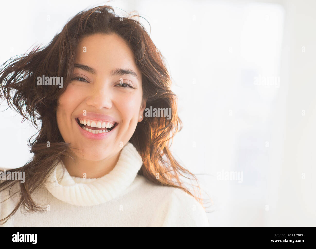 Portrait of young woman laughing Stock Photo - Alamy