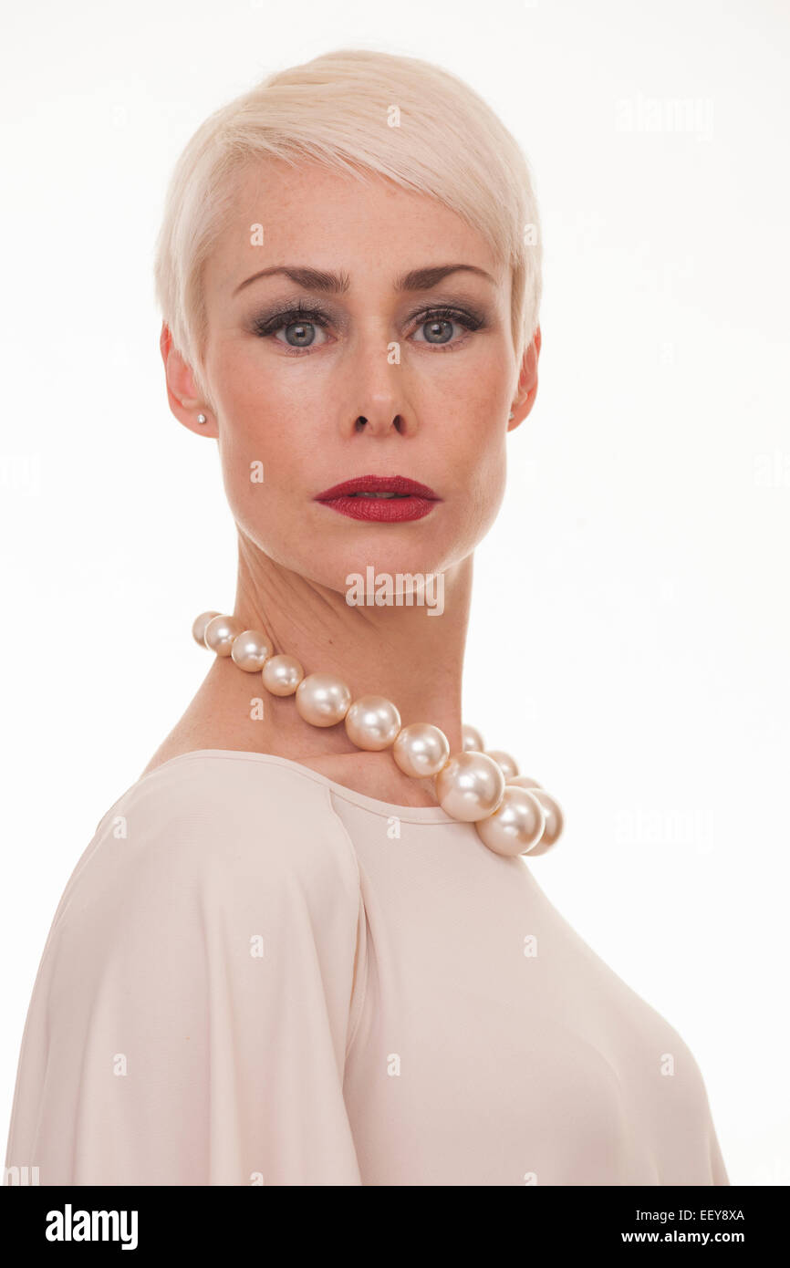 Mature woman with short blonde hair hi-res stock photography and images -  Alamy