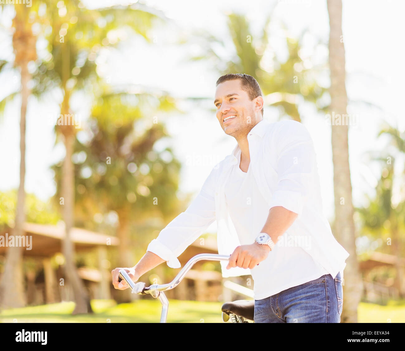 USA, Florida, Jupiter, Man riding bike Stock Photo Alamy