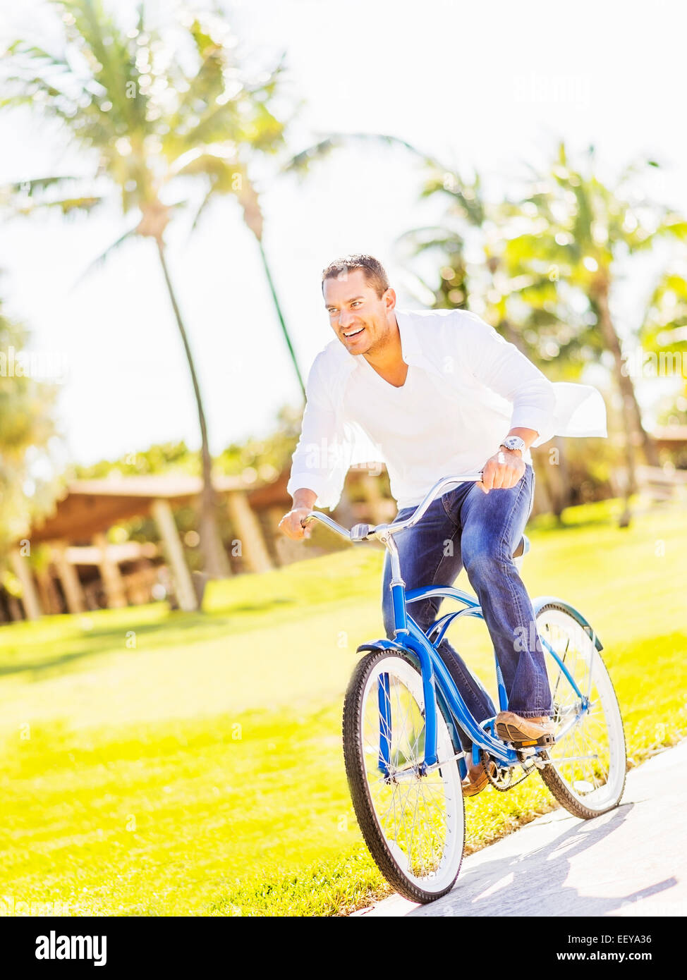 USA, Florida, Jupiter, Man riding bike Stock Photo Alamy