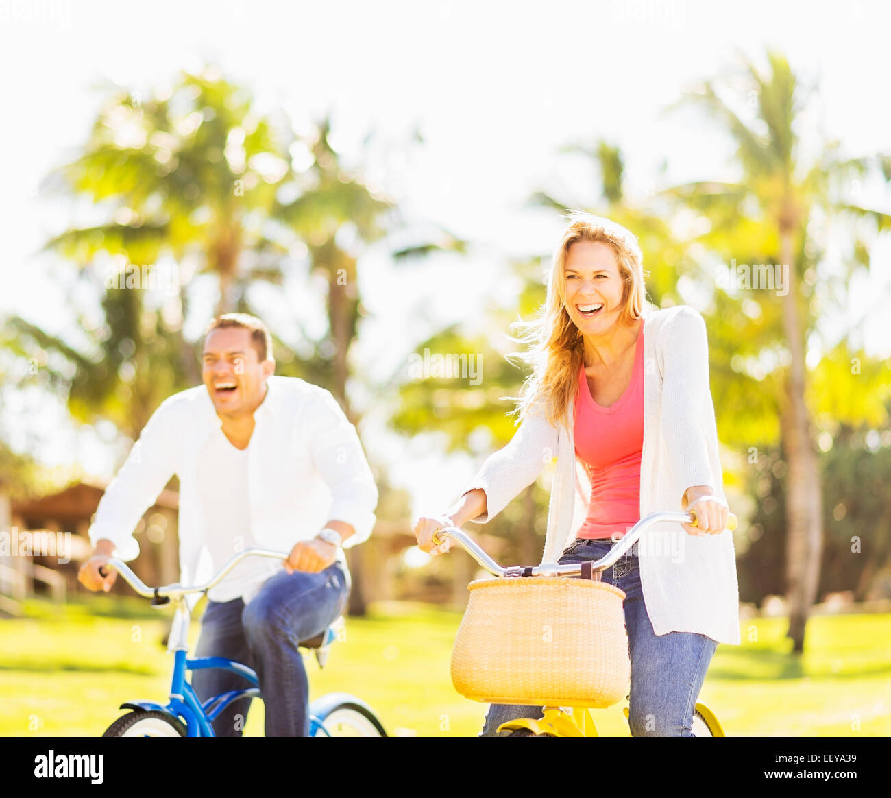 USA, Florida, Jupiter, Couple riding on bikes Stock Photo Alamy