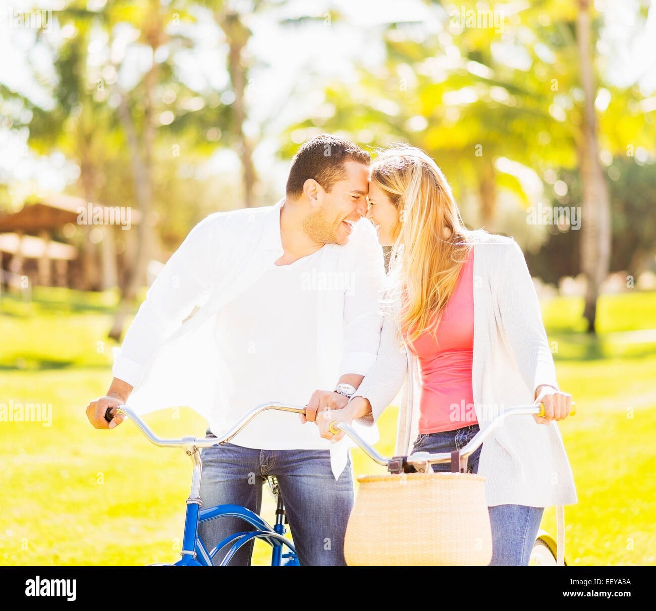 USA, Florida, Jupiter, Couple riding on bikes Stock Photo Alamy