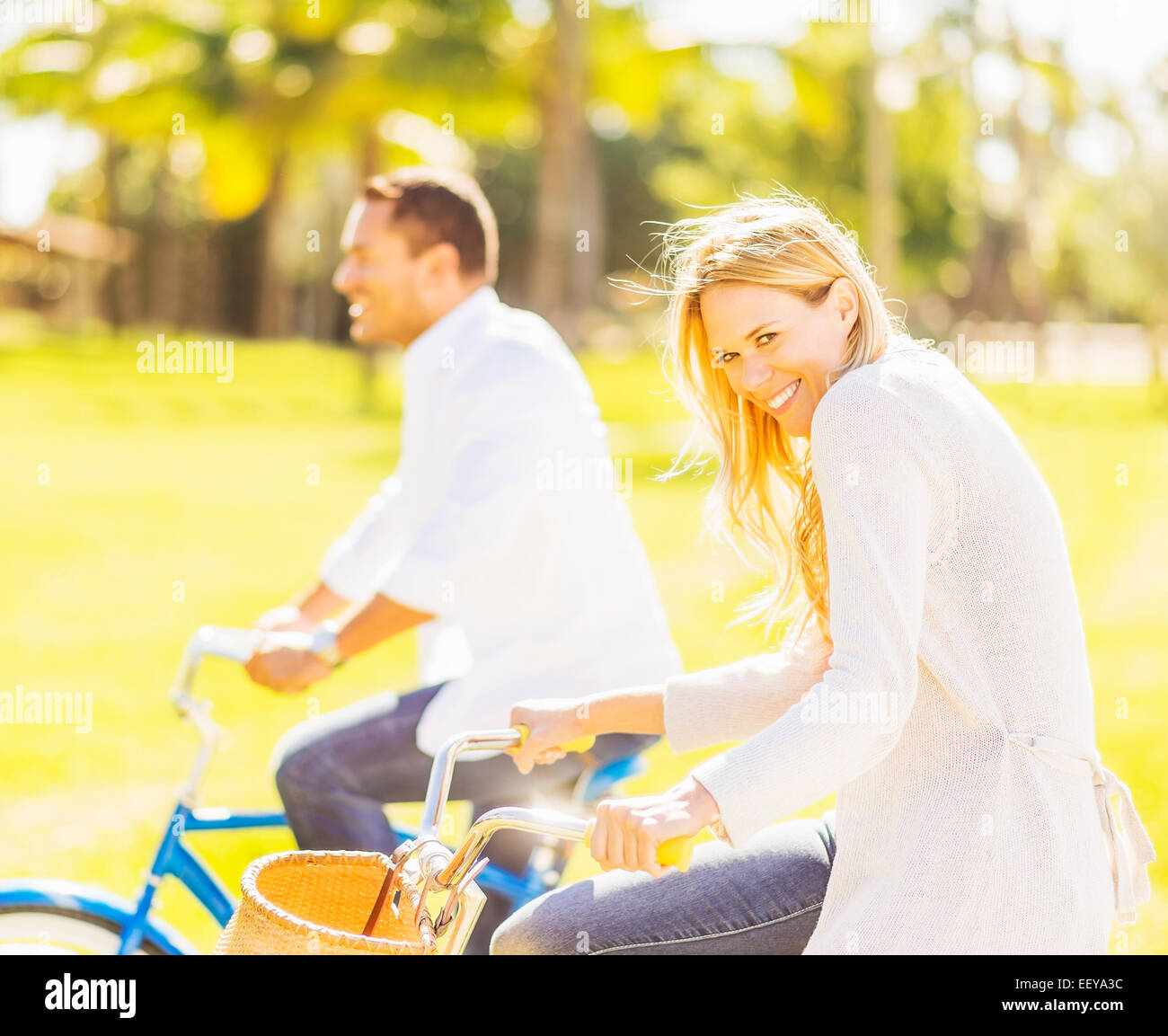 USA, Florida, Jupiter, Couple riding on bikes Stock Photo Alamy