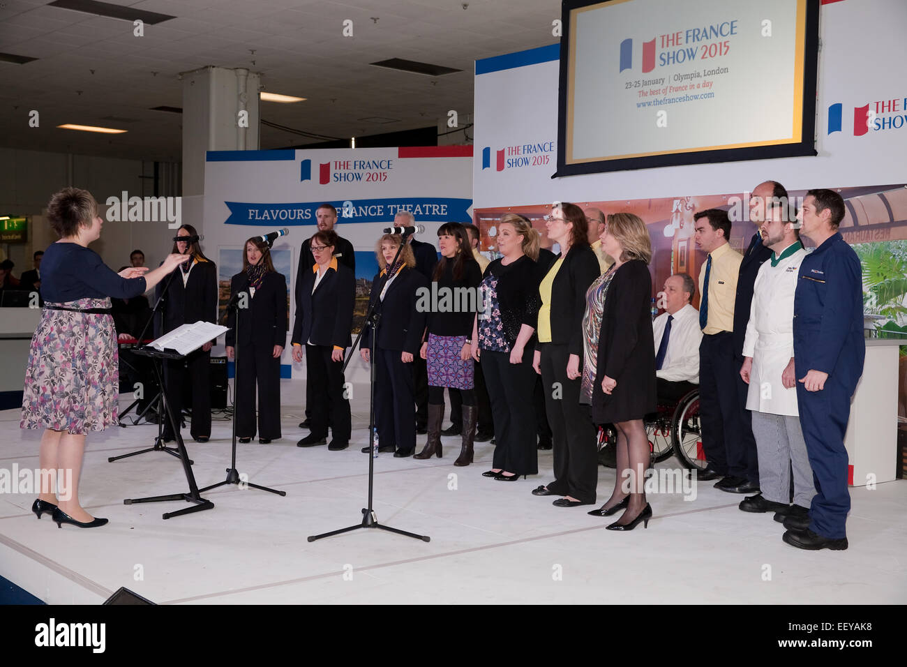 P&O staff choir sing at the France Show 2015 in Olympia London Stock Photo