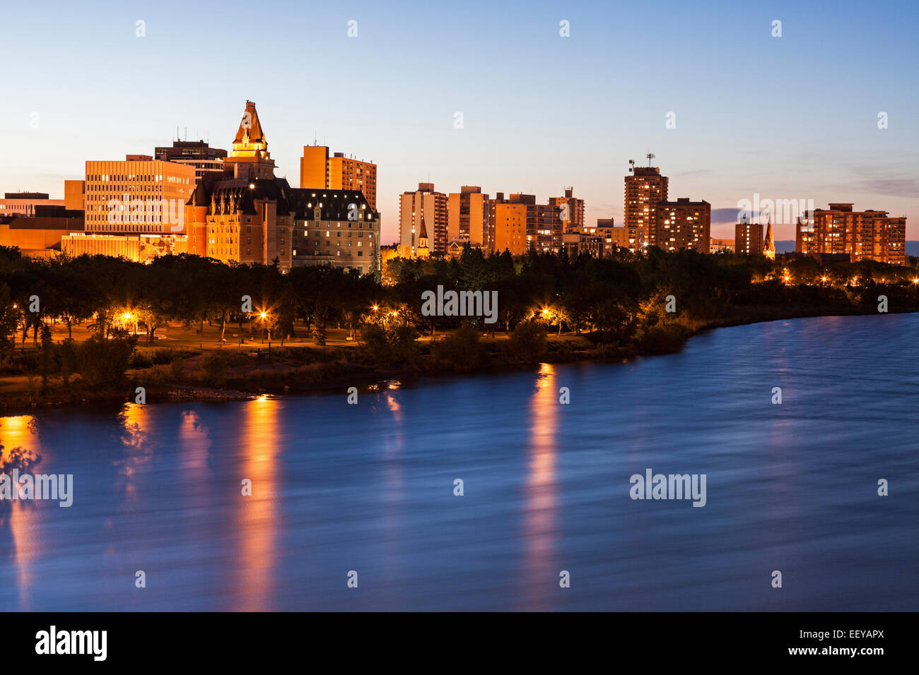 Canada, Saskatchewan, Saskatoon, Illuminated cityscape at dusk Stock Photo