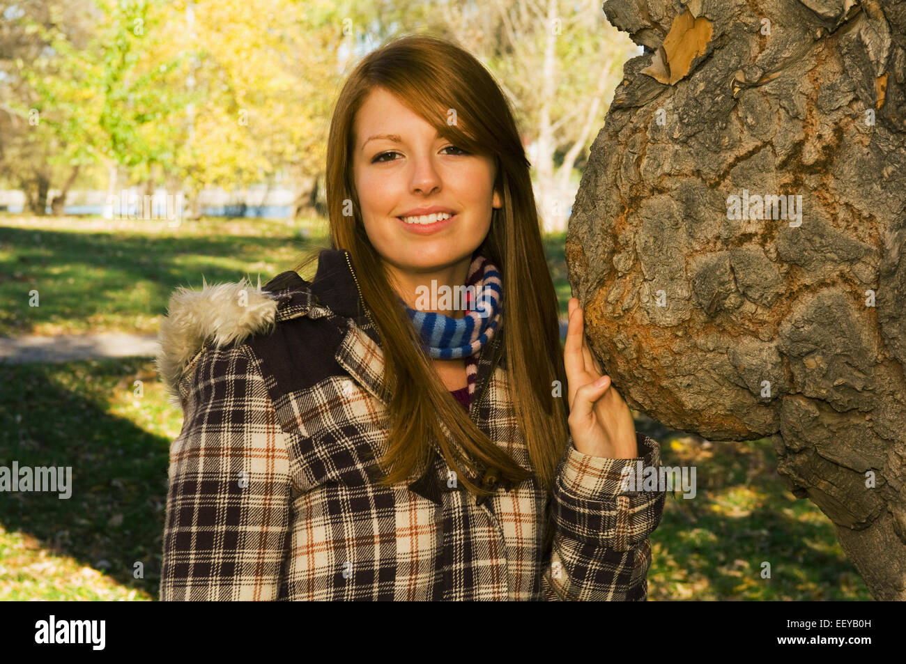 Young woman in a park Stock Photo - Alamy