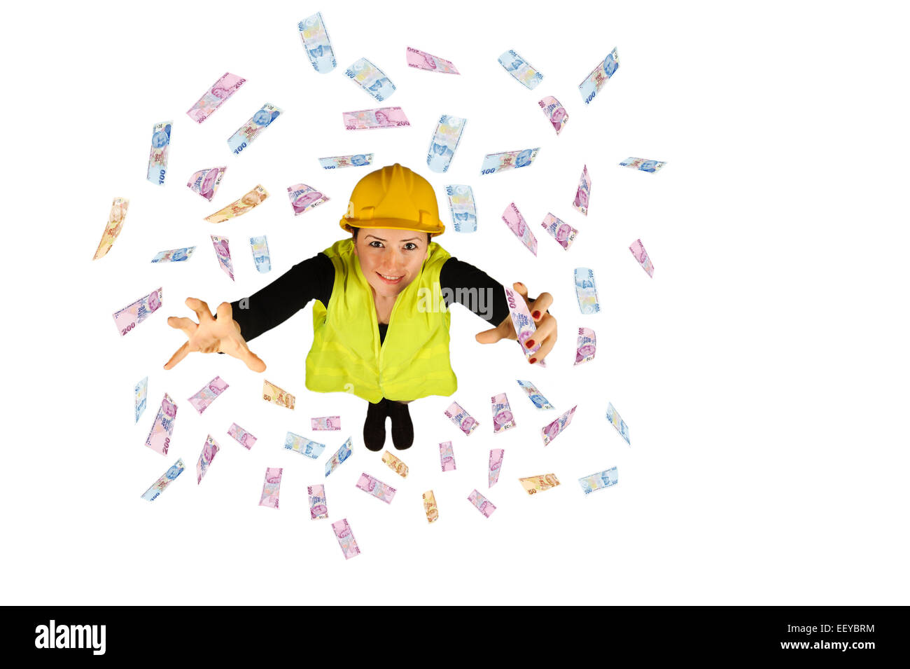 blue collar worker wages money flying Turkish lira isolated on white background Stock Photo