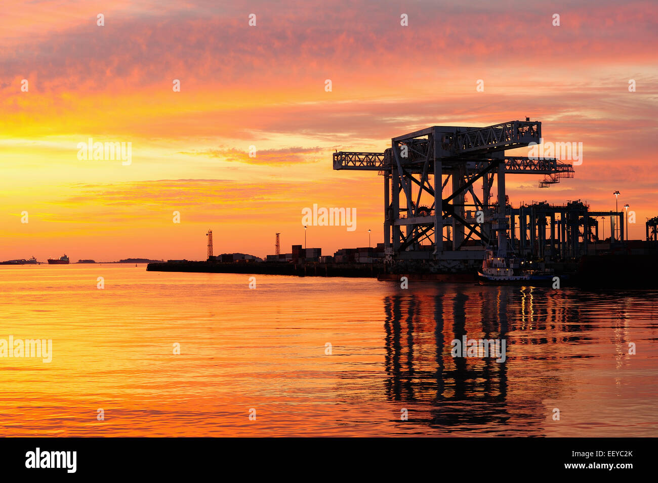 USA, Massachusetts, Boston, Colorful sky over Boston Harbor Dock Stock