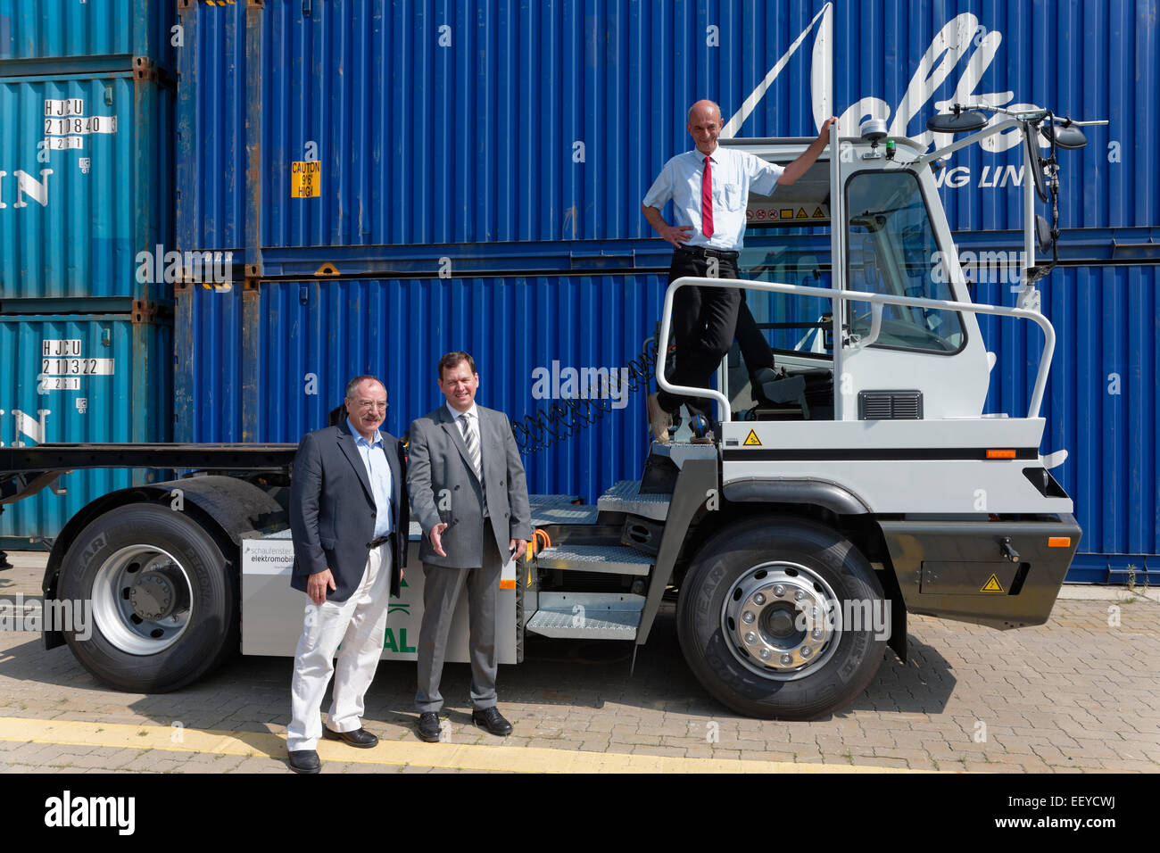 Berlin, Germany, Herbert Sonntag, Peter StÃ¤blein and Carsten Giese at an electric truck Stock Photo