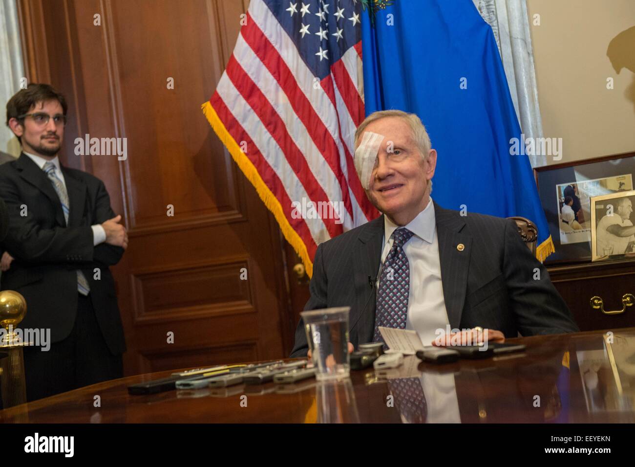 US Democratic Senate Leader Harry Reid with a patch over his injured eye holds his weekly press conference January 22, 2015 in Washington, DC. The 75-year-old Reid suffered an accident while exercising on New Year's Day resulting in four broken ribs and may leave him permanently blind in one eye. Stock Photo