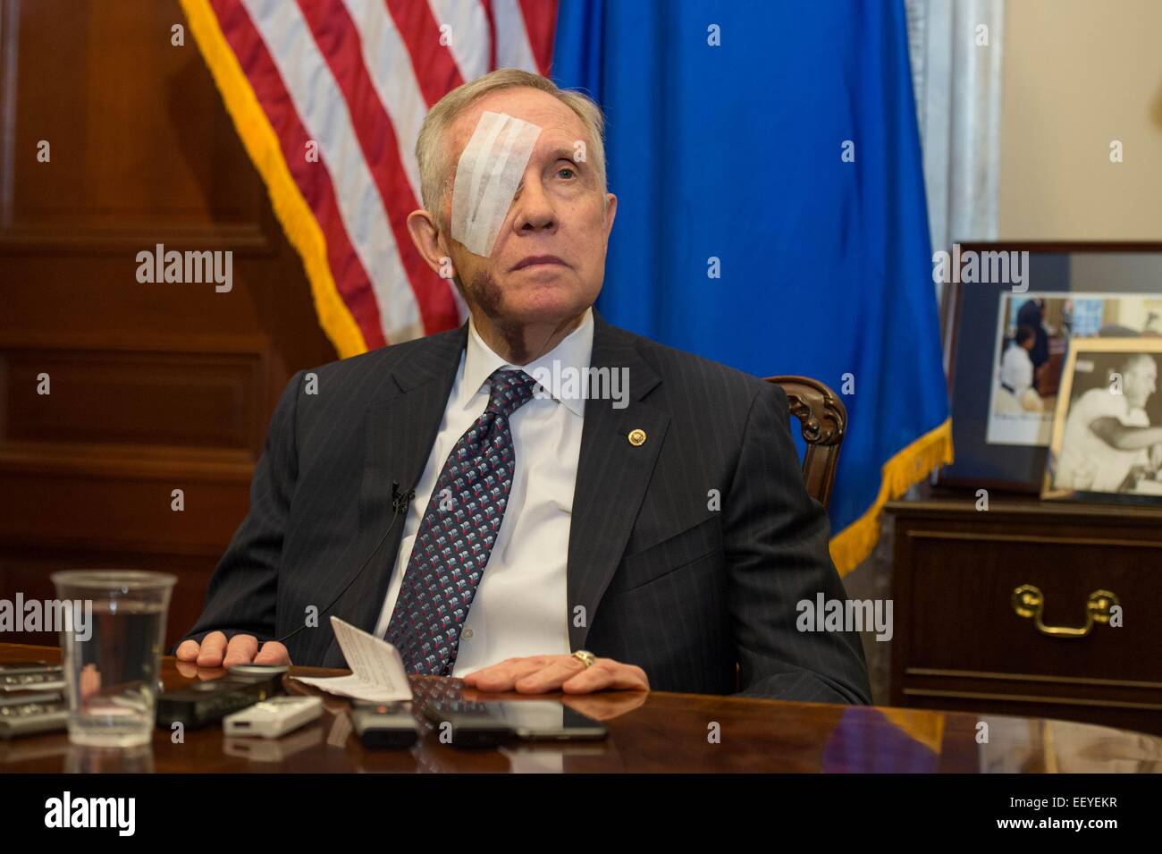 US Democratic Senate Leader Harry Reid with a patch over his injured eye holds his weekly press conference January 22, 2015 in Washington, DC. The 75-year-old Reid suffered an accident while exercising on New Year's Day resulting in four broken ribs and may leave him permanently blind in one eye. Stock Photo