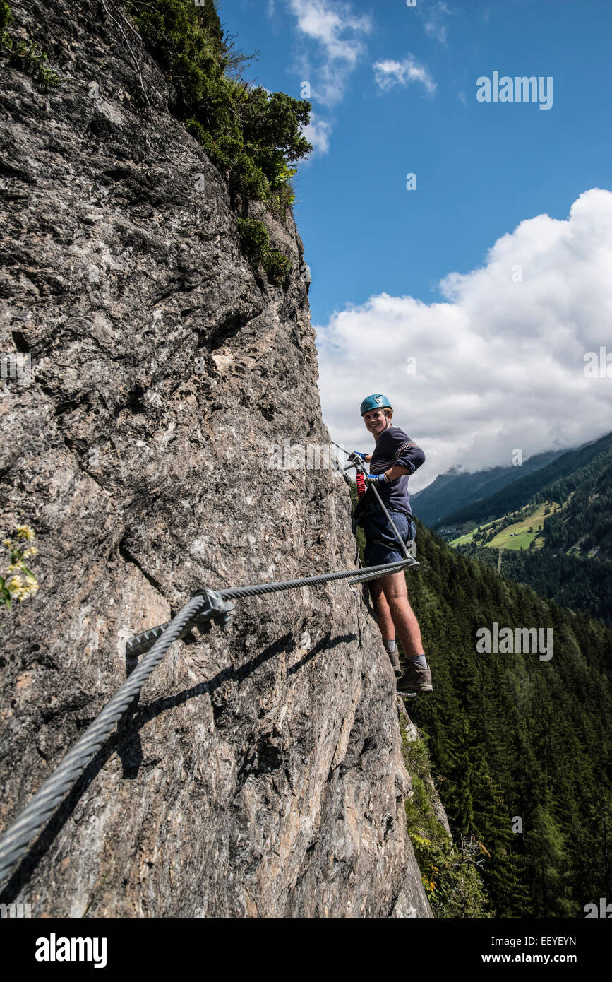 Climbers in action on Klettersteig protected climbing paths Stock Photo