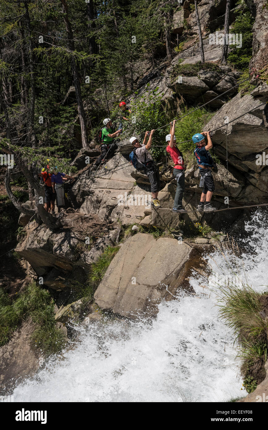 Climbers in action on Klettersteig protected climbing paths Stock Photo