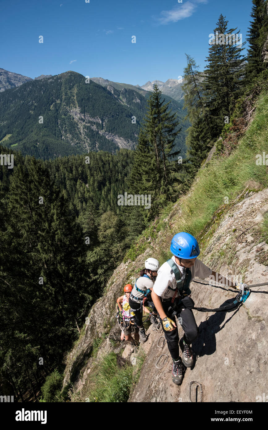 Climbers in action on Klettersteig protected climbing paths Stock Photo