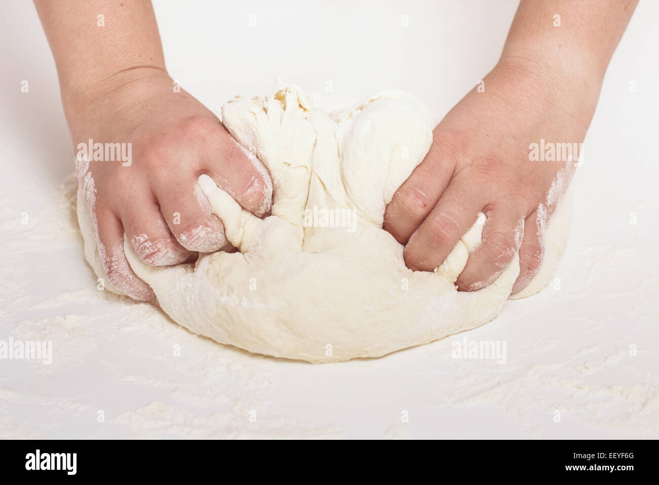 Woman Hands Kneading Dough on the table Stock Photo - Alamy