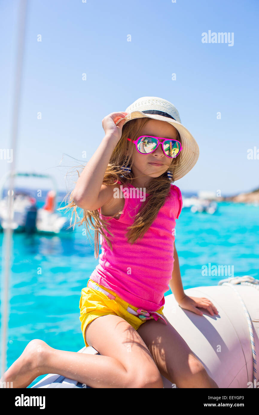 Cute little girl enjoying sailing on boat in the sea Stock Photo Alamy