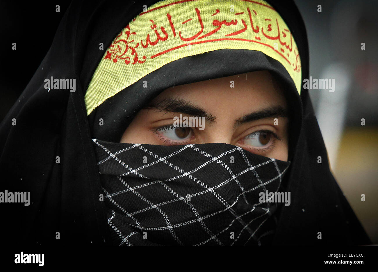 Mashhad, Iran. 23rd Jan, 2015. An Iranian woman takes part in a protest against the printing of satirical sketches of the Prophet Muhammad by French magazine Charlie Hebdo in Mashhad, Iran, on Jan. 23, 2015. © Ahmad Halabisaz/Xinhua/Alamy Live News Stock Photo