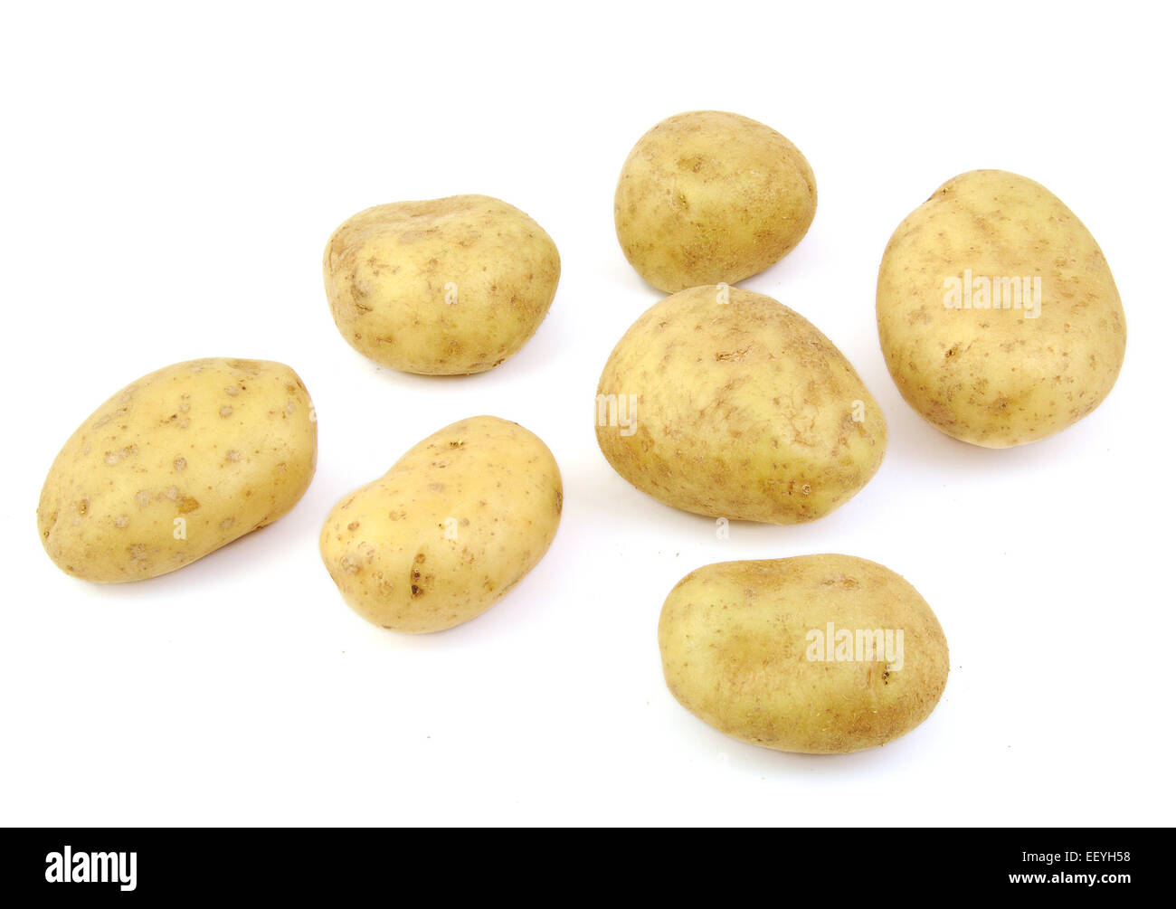 Potatoes on white background Stock Photo - Alamy