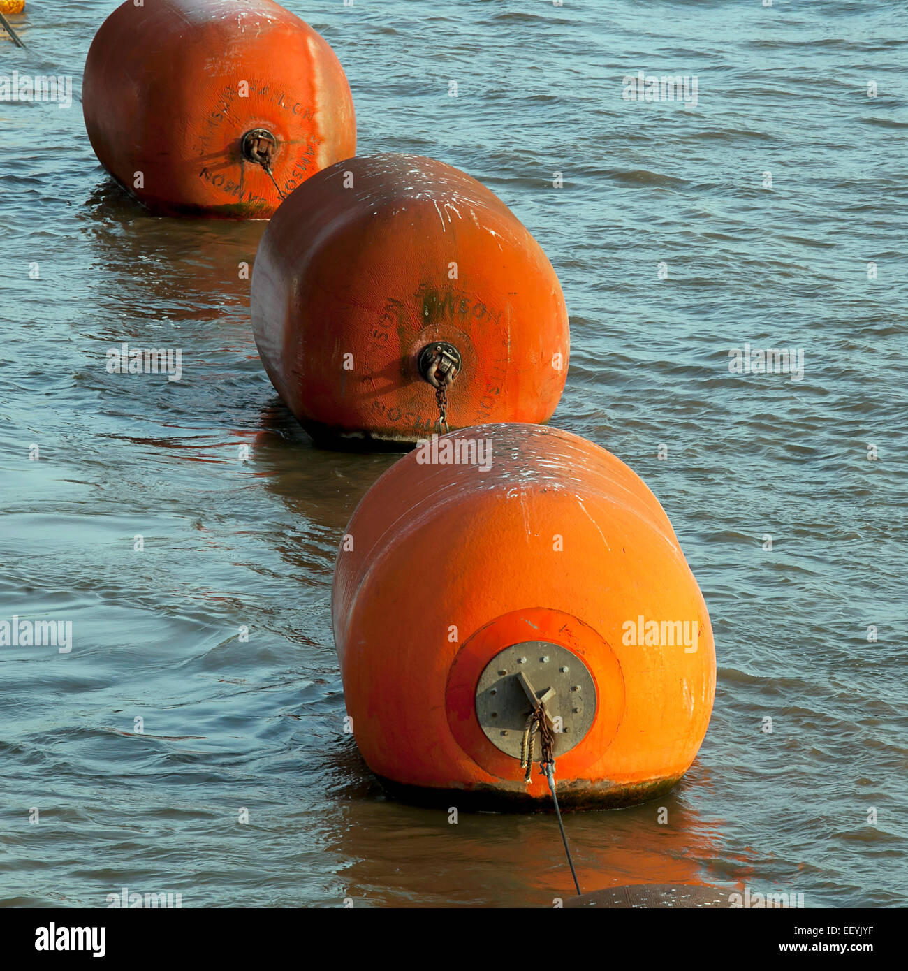 Orange Buoy Floating In Ocean Stock Photo - Alamy