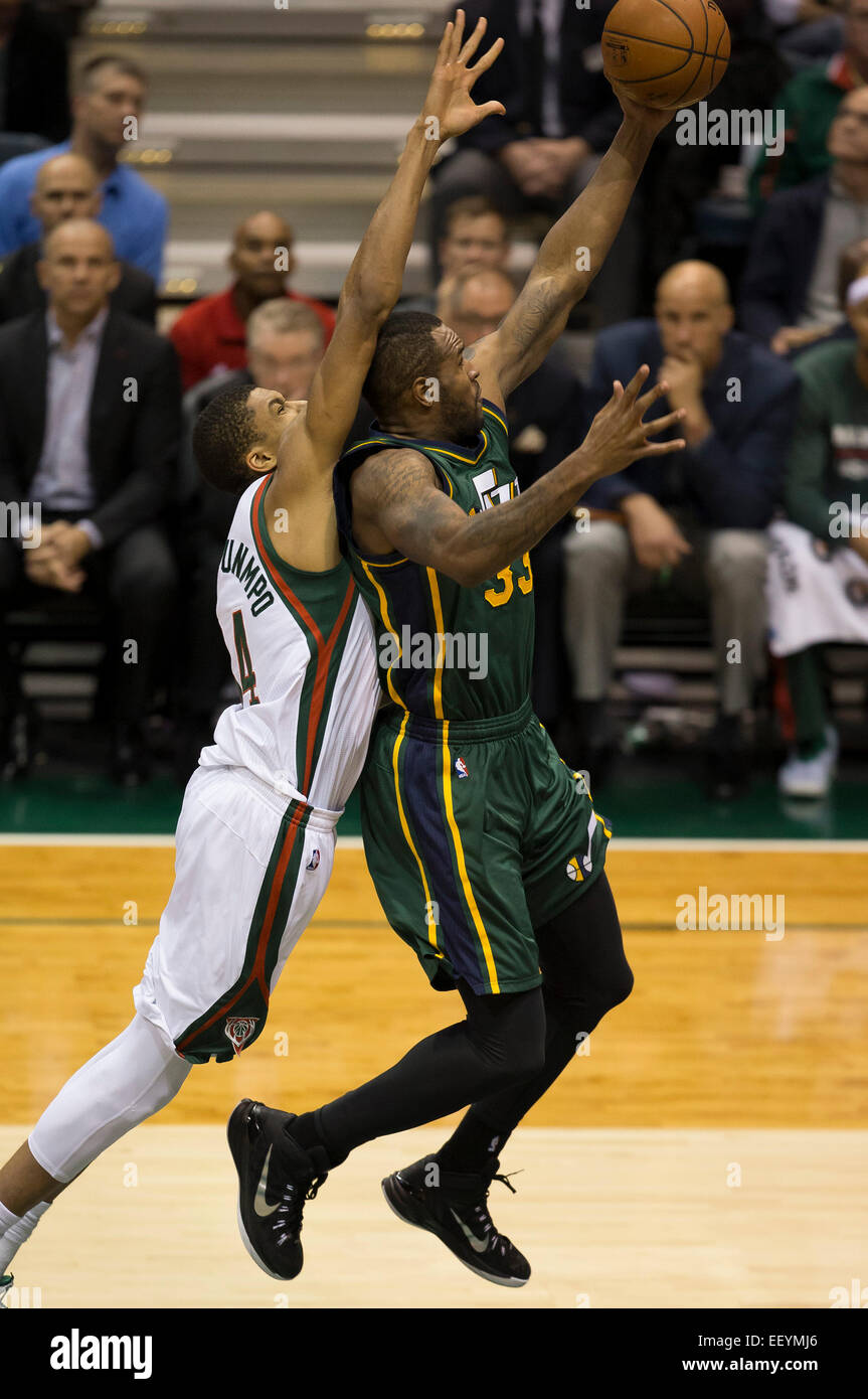 Milwaukee, WI, USA. 22nd Jan, 2015. Utah Jazz forward Trevor Booker (33) goes in for a lay up during the NBA game between the Utah Jazz and the Milwaukee Bucks at the BMO Harris Bradley Center in Milwaukee, WI. Utah defeated Milwaukee 101-99. John Fisher/CSM/Alamy Live News Stock Photo