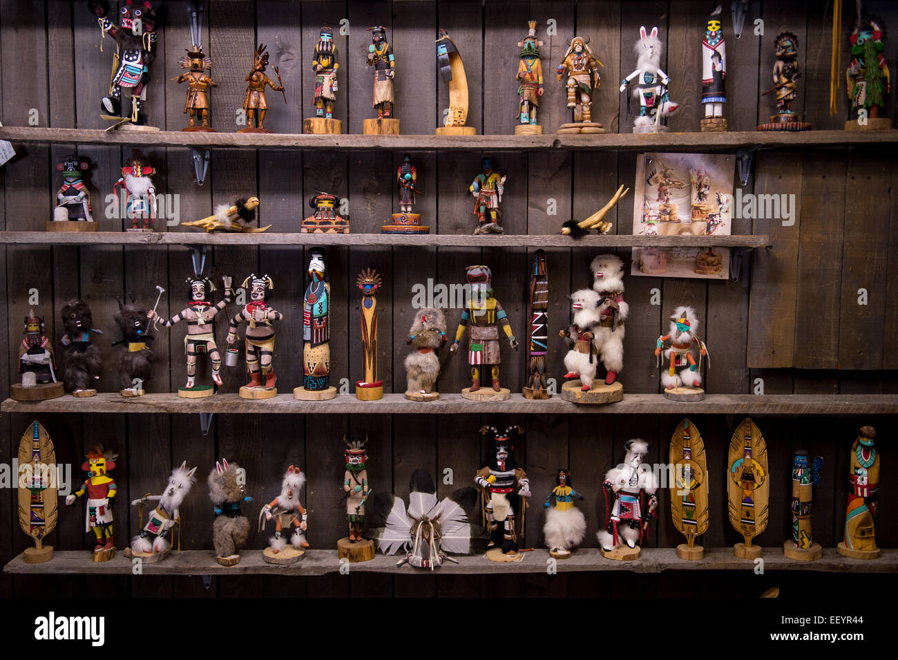 Cultural artifacts stand on shelves in the Montana Fur Trading in