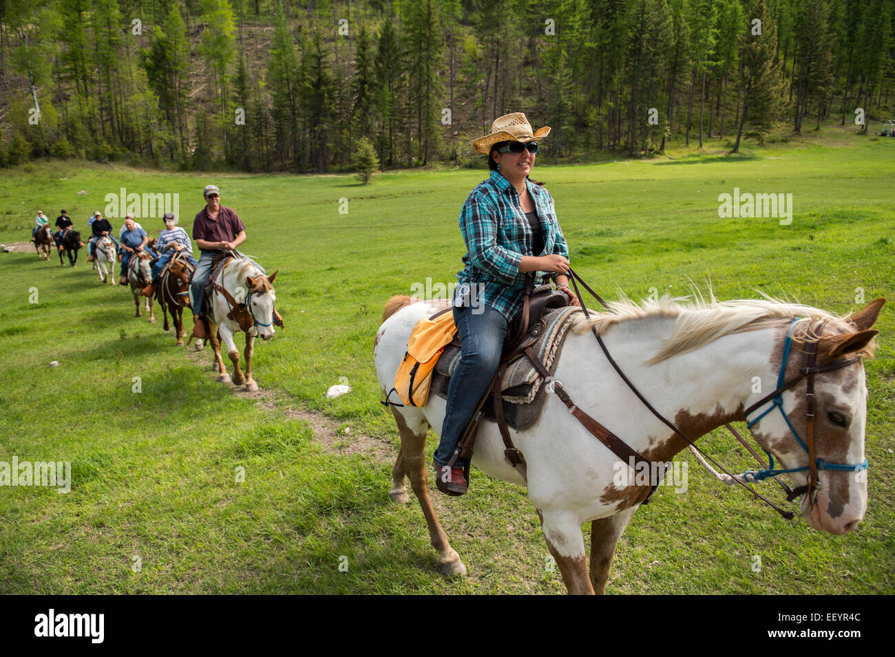 Alicia Hammond takes guests for a ride at Artemis Acres Guest Ranch in
