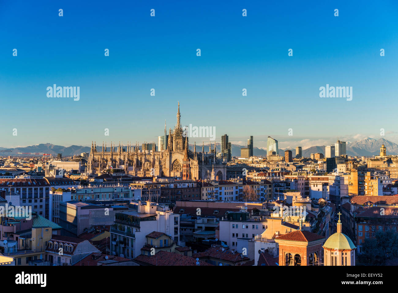 Milano, 2015 panoramic skyline with Italian Alps on Background Stock Photo