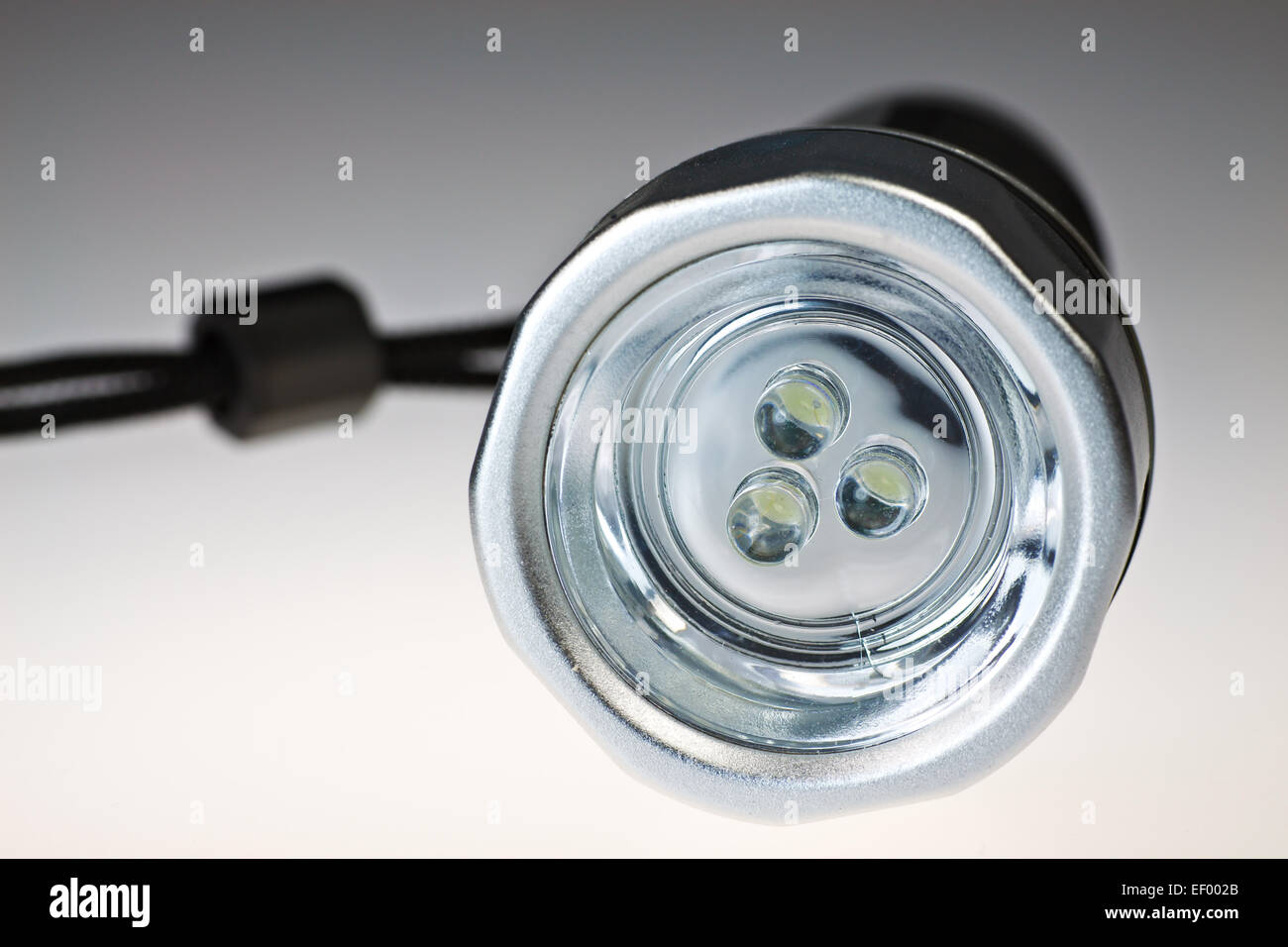 An LED flashlight. Stock Photo