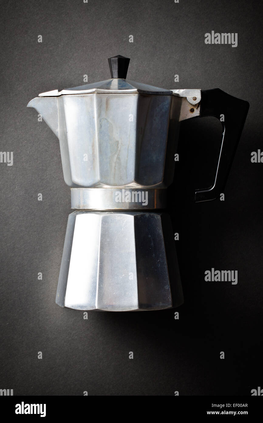 https://c8.alamy.com/comp/EF00AR/coffee-maker-bialetti-on-black-background-EF00AR.jpg
