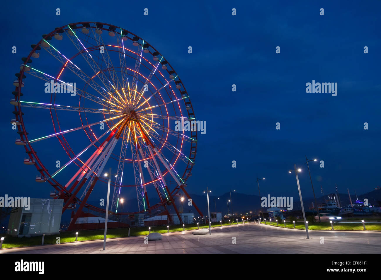 Ferris wheel and night park in Batumi, Georgia Stock Photo