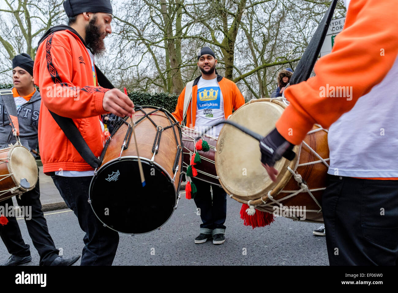 Drummers representing the Borough of Lewisham prepare to participate in London 2015 New Year's Day Parade Stock Photo