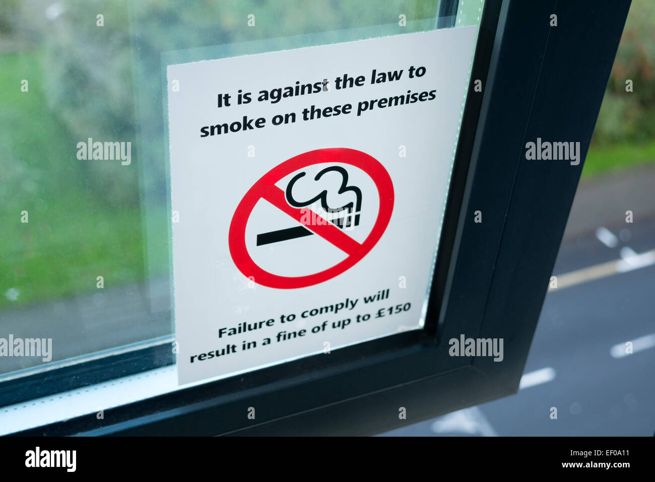 No Smoking Warning sticker on window Stock Photo
