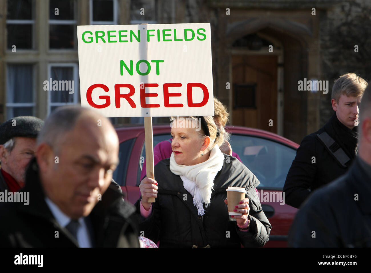 Witney, Oxfordshire, UK. 24th January, 2015. Susan House from Ducklington, Oxfordshire joined more than 200 people, from local protest groups and political parties joined members of the public at a rally held by Rural Oxfordshire Action Rally - ROAR - on Church Green, Witney to protest against planning procedures. Credit:  Ric Mellis/Alamy Live News Stock Photo