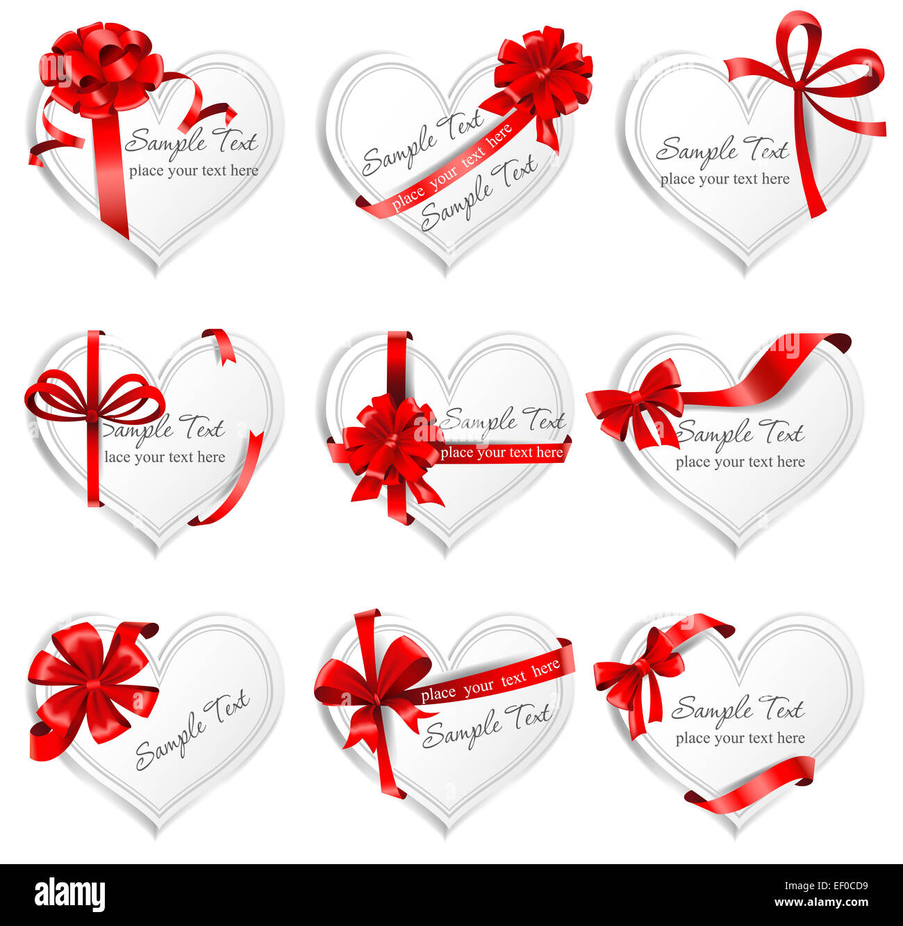 Festive heart-shaped  cards with red gift ribbons. Stock Photo