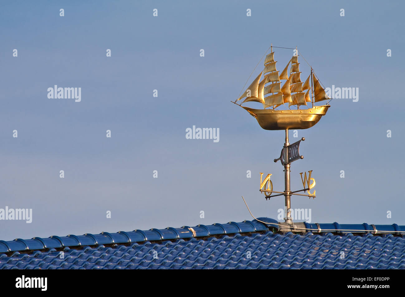 A sailing boat on the roof. Stock Photo