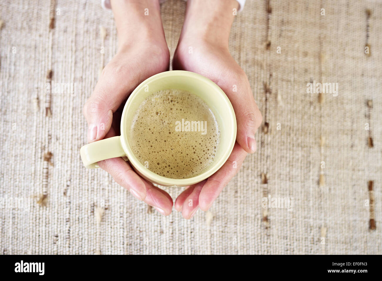 hands holding coffee cup Stock Photo