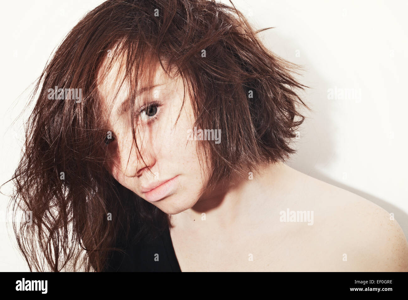 Portrait of a beautiful young woman on white background Stock Photo - Alamy