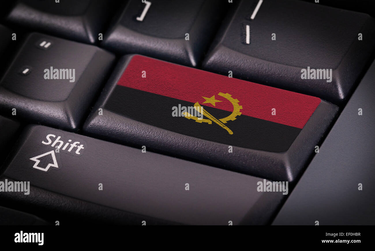 Flag on button keyboard, flag of Angola Stock Photo - Alamy