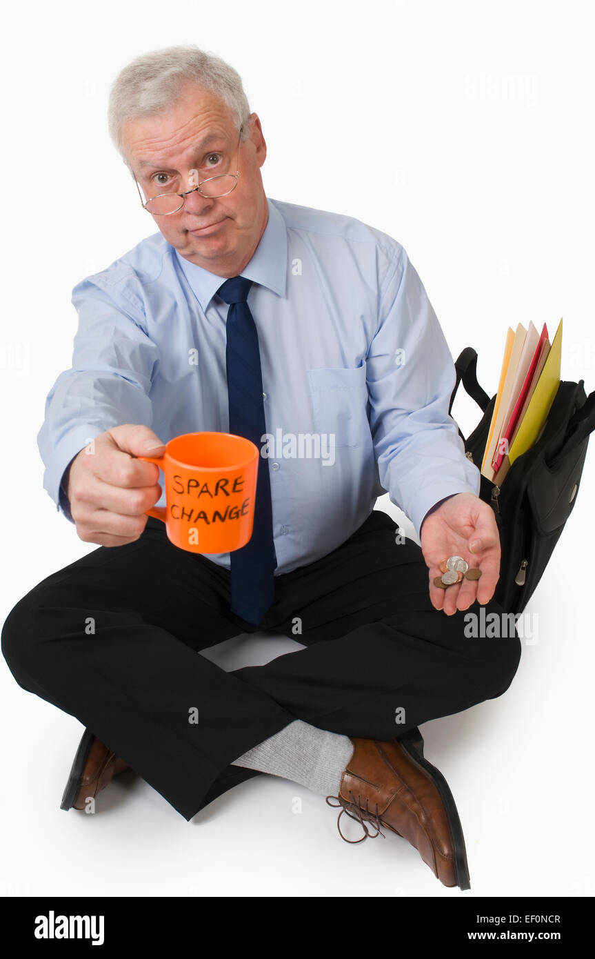 Businessman panhandling for spare change Stock Photo - Alamy