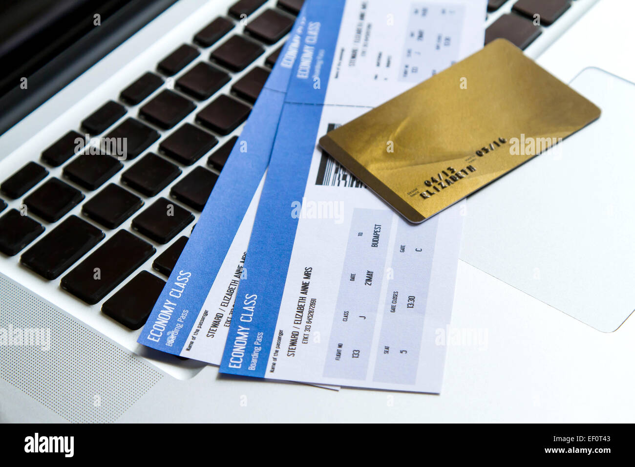 Buying airline tickets on line with a credit card Stock Photo Alamy