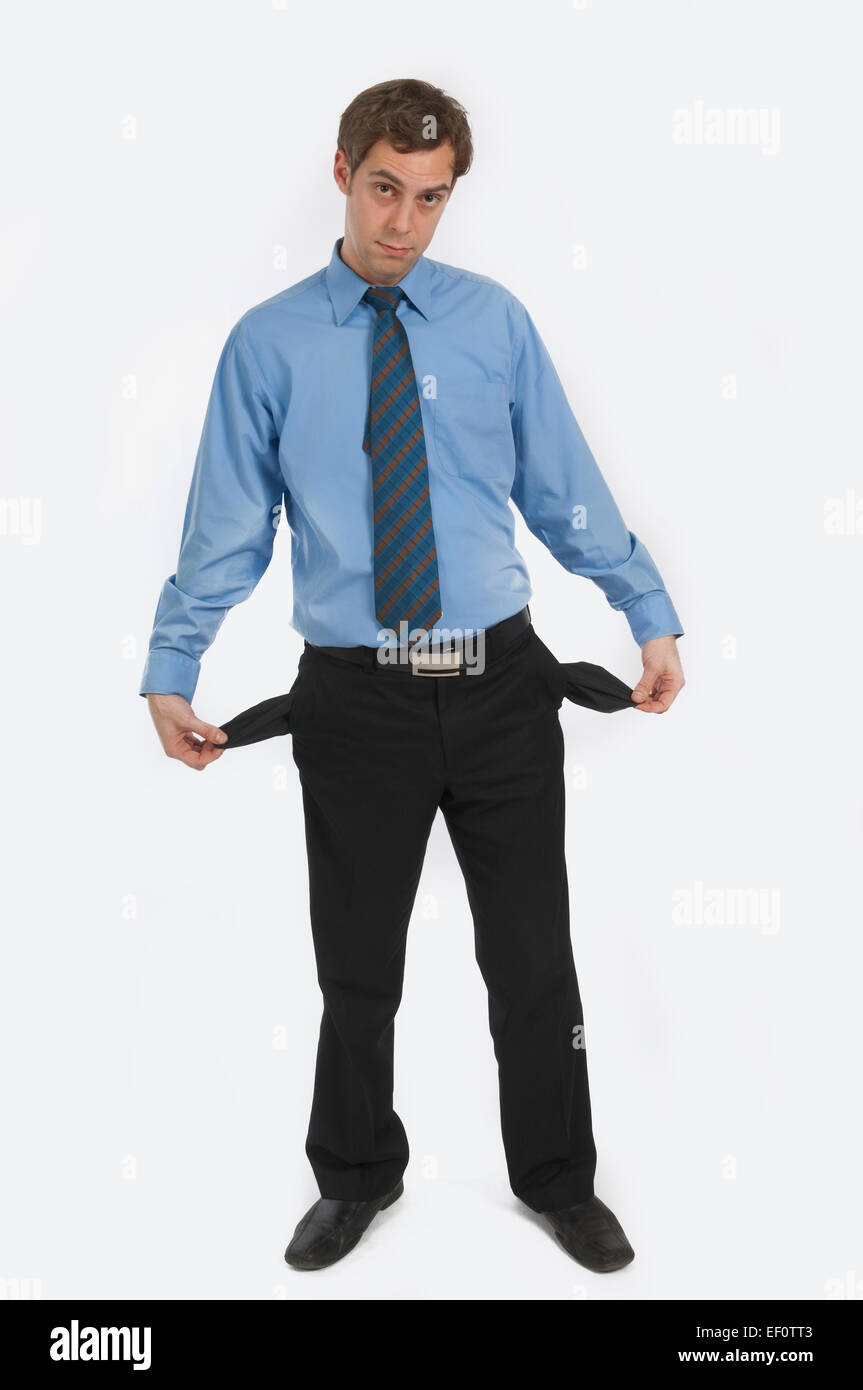 Businessman turning his pockets inside out Stock Photo - Alamy