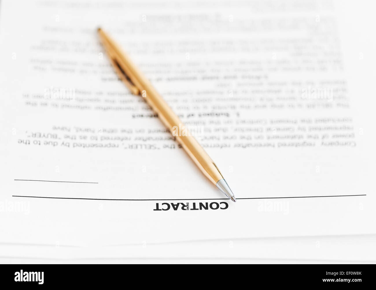 pages of sales contract and golden pen close up Stock Photo