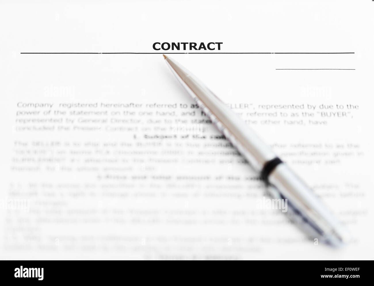 silver pen on sheet of sales contract close up Stock Photo