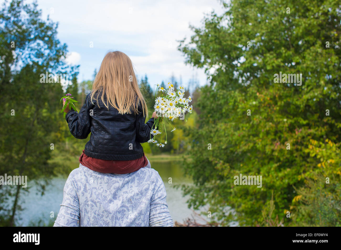 Young happy father with daughter in the park Stock Photo - Alamy
