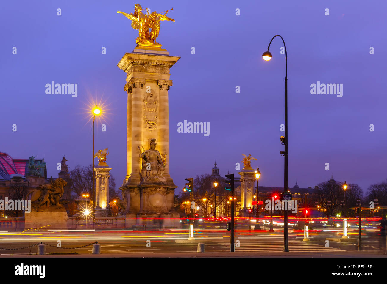 Pont Alexandre III or Alexander III bridge at night illumination in Paris, France Stock Photo