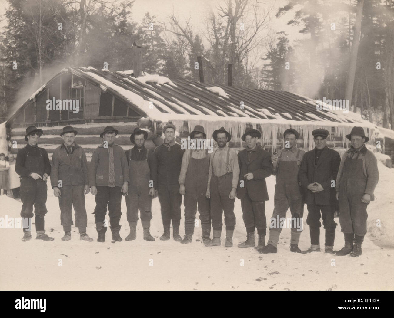 A group of lumberjacks is shown in this 1917 photograph, capturing the ...