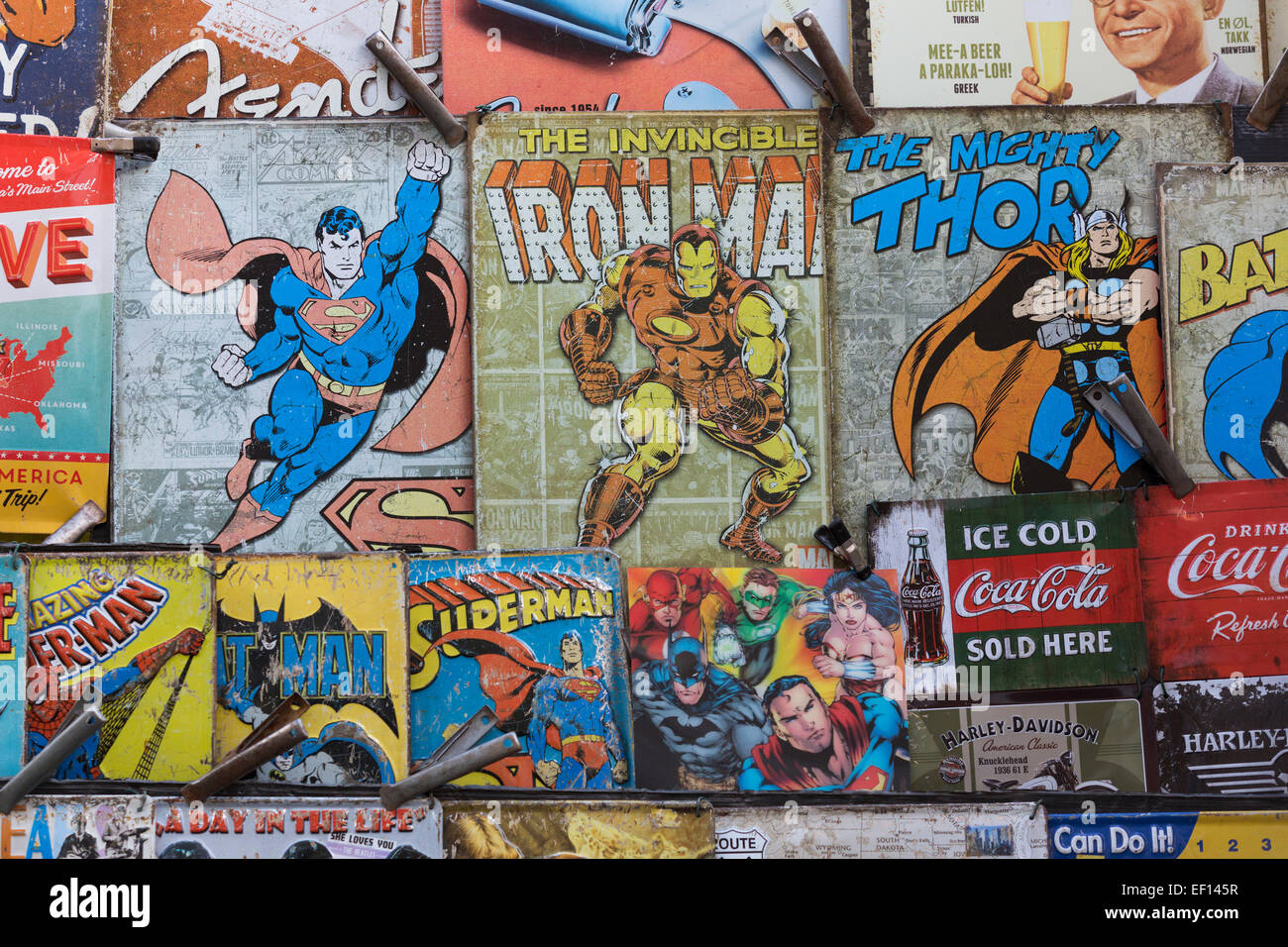 Superman, Iron Man and The Mighty Thor memorabilia metal signs for sale at Portobello Market, London, England, United Kingdom Stock Photo