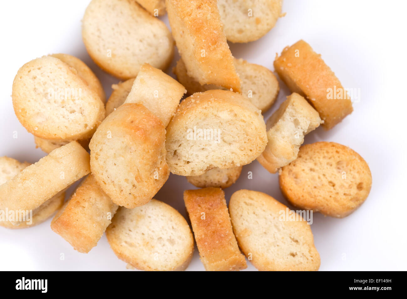 White bread croutons with salt on a white background Stock Photo Alamy