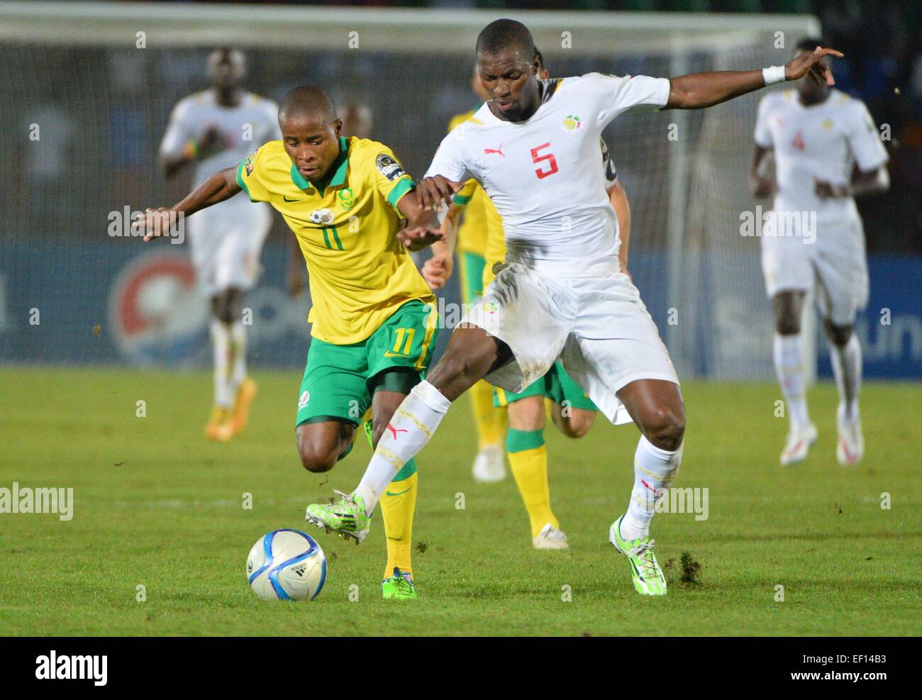 Equitorial Guinea. 23rd Jan, 2015. African Cup of nations football. South Africa versus Senegal. Thabo Matlaba (AFS) challenged by Papa Kouly Diop (SEN) © Action Plus Sports/Alamy Live News Stock Photo