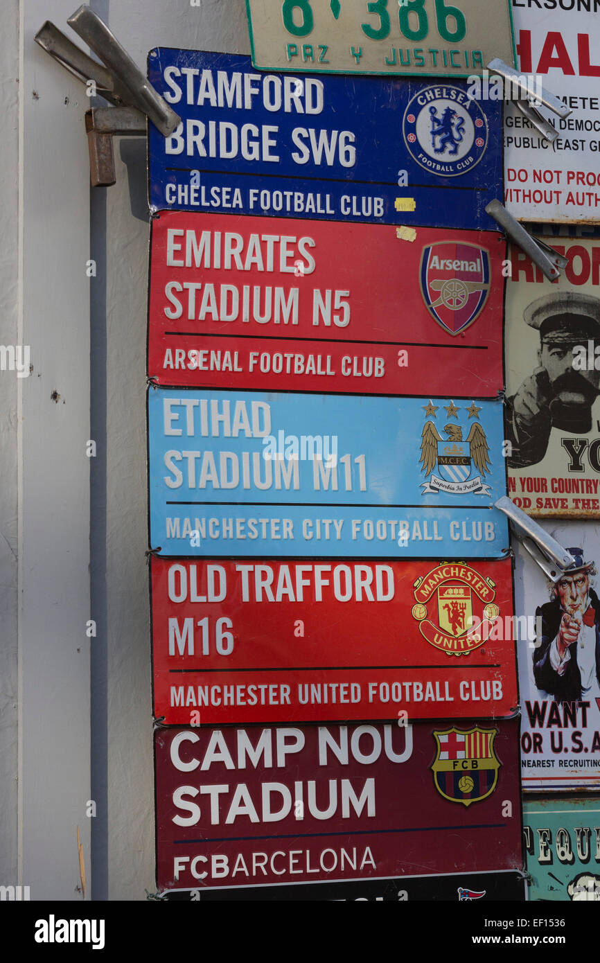 Metal signs of football grounds, UK stadiums and Barcelona, on sale at Portobello Market, Notting Hill, London Stock Photo